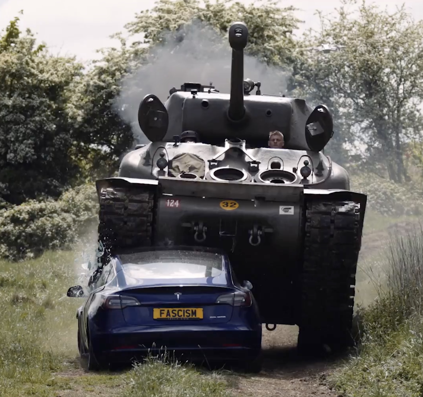 Anti-Elon Musk Group Crushes Tesla Model 3 With Sherman Tank