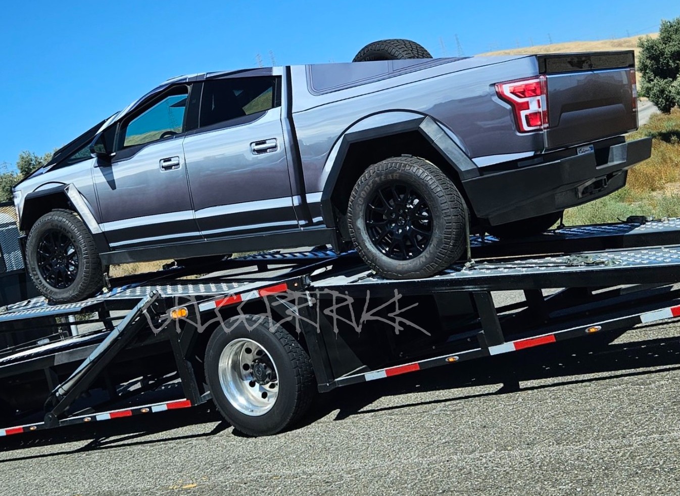 Tesla trolls Ford as Cybertruck dressed as F-150 hits the streets