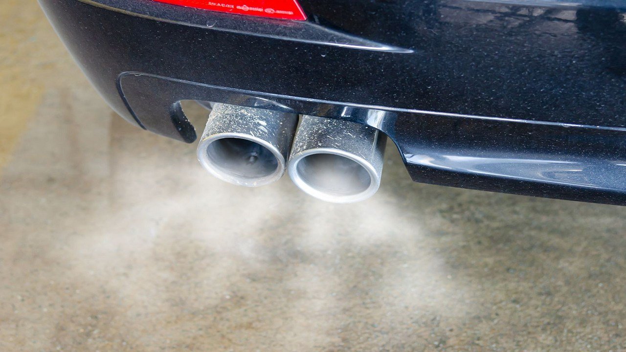 How do I identify and fix a car exhaust leak?