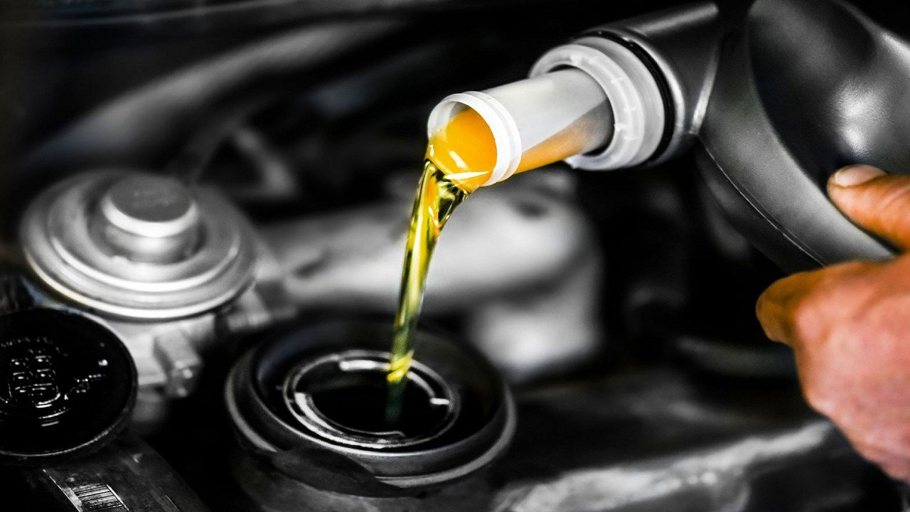 How do I check and add engine oil to my car?