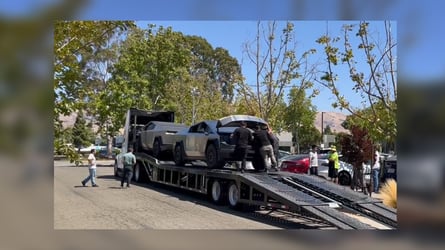 Tesla Cybertruck Spotted With Frunk Open On Semi Car Hauler