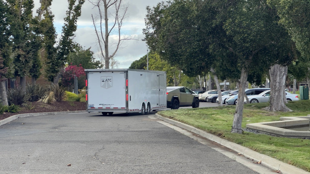 Tesla Cybertruck Spotted Towing Trailer