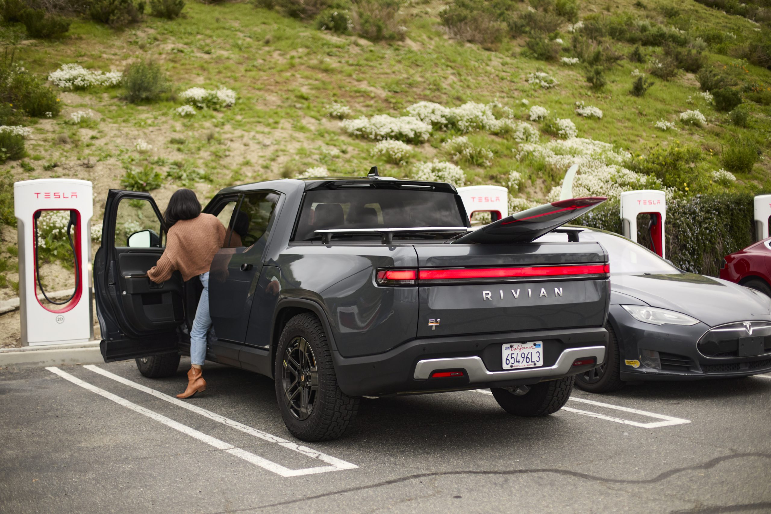 Rivian Owner Demos Tesla Supercharger Access