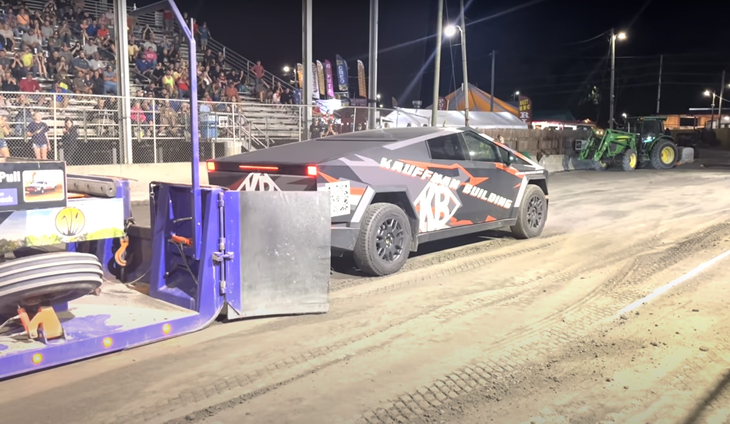 Tesla Cybertruck Silences Crowd With 260 Foot Sled Pull