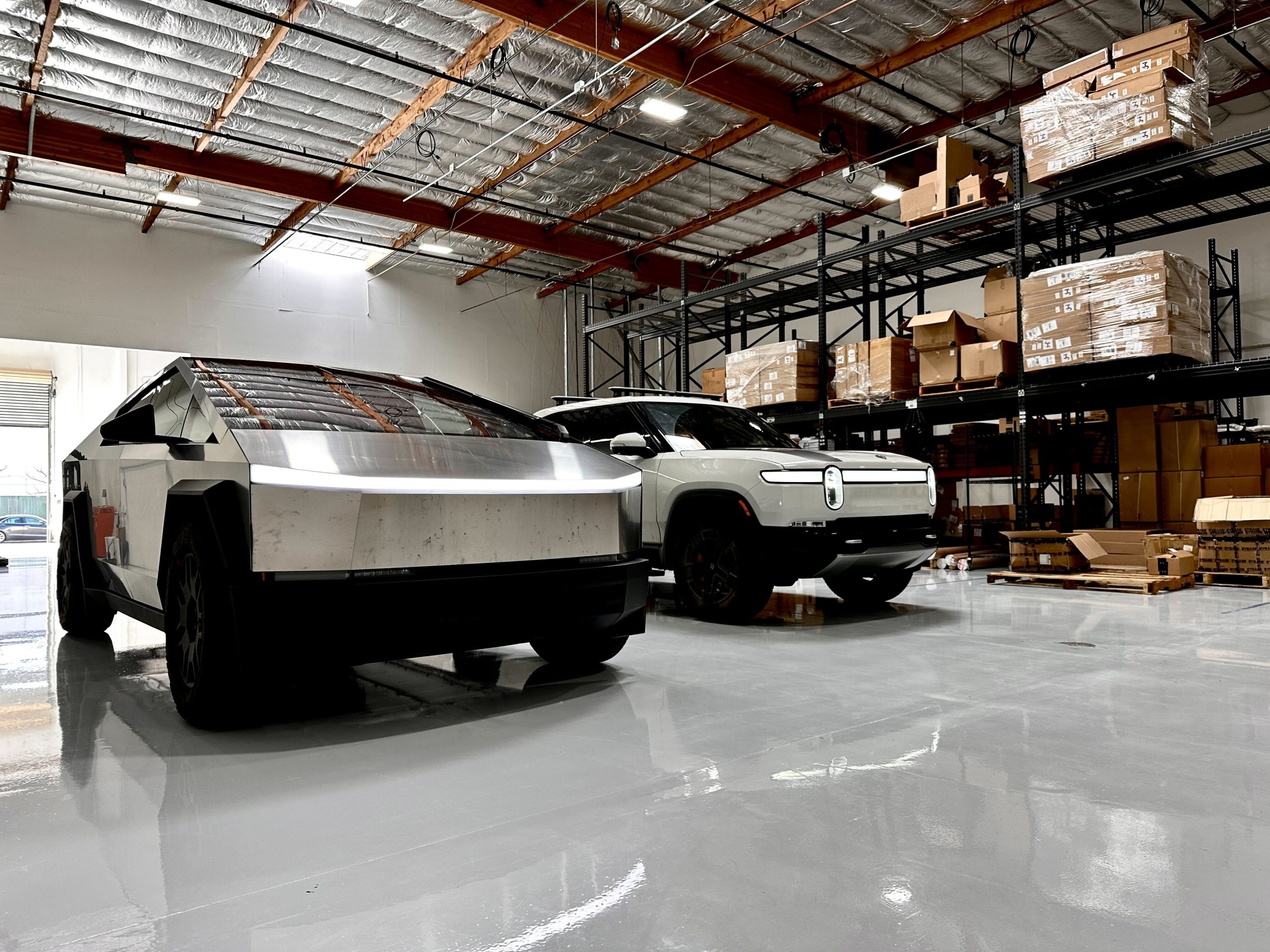 Tesla Reaches Conditional Settlement in Rivian Trade Theft Suit