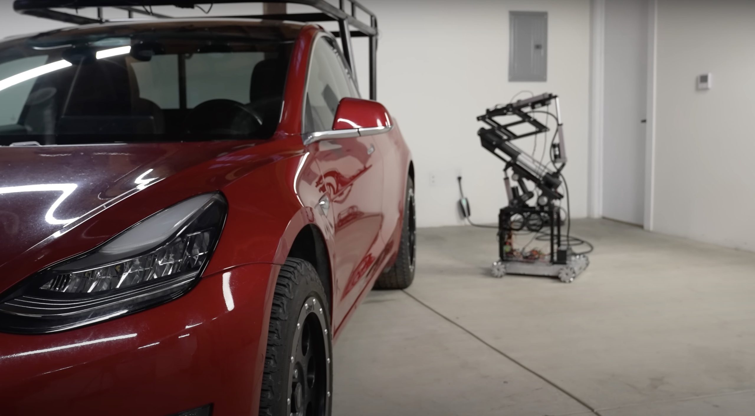 Tesla Model 3 pickup “Truckla” gets updates and a perfectly wholesome robot charger