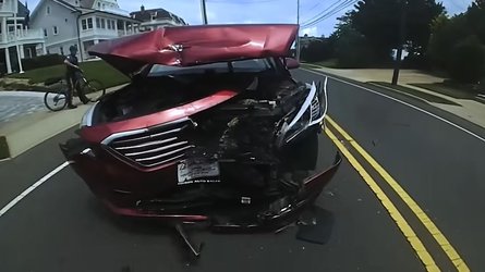 Watch Car Slam Into Tesla Model X Near Roadblock And Police Officer